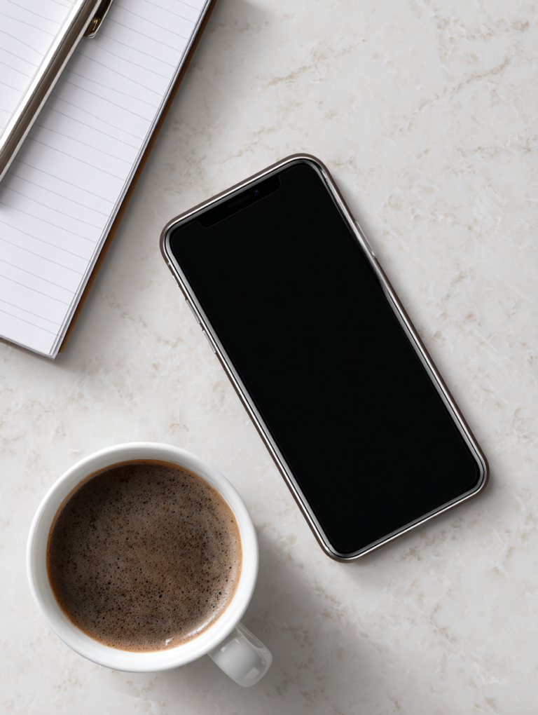 Smartphone and coffee flat-lay representing self-paced online cosmetology continuing education